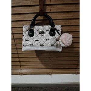 Luv Betsey White Quilted Bow Top Handle Bag with Black Handles, Pom Pom Charm